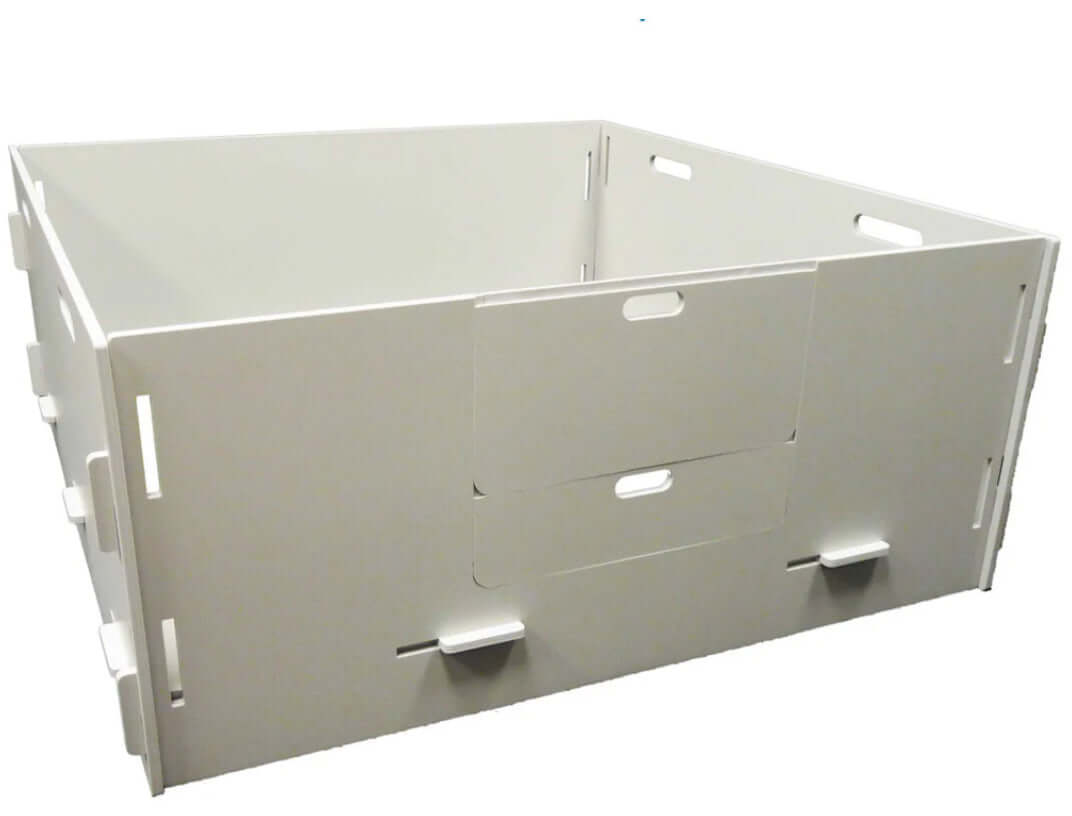 A modular whelping box with interlocking sides, designed for easy assembly and disassembly. It provides a secure and comfortable space for a dog to give birth and care for her puppies.