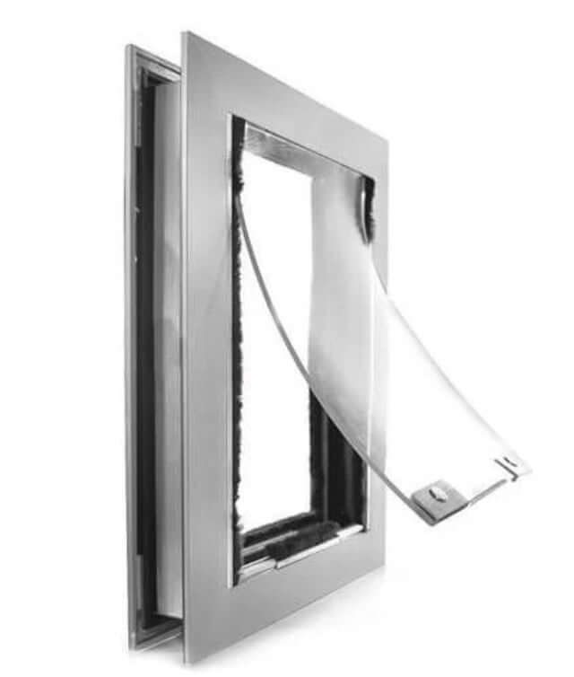 Halie pet door for dogs and cats installed in a standard door, featuring a secure flap and weather-resistant frame for easy pet access