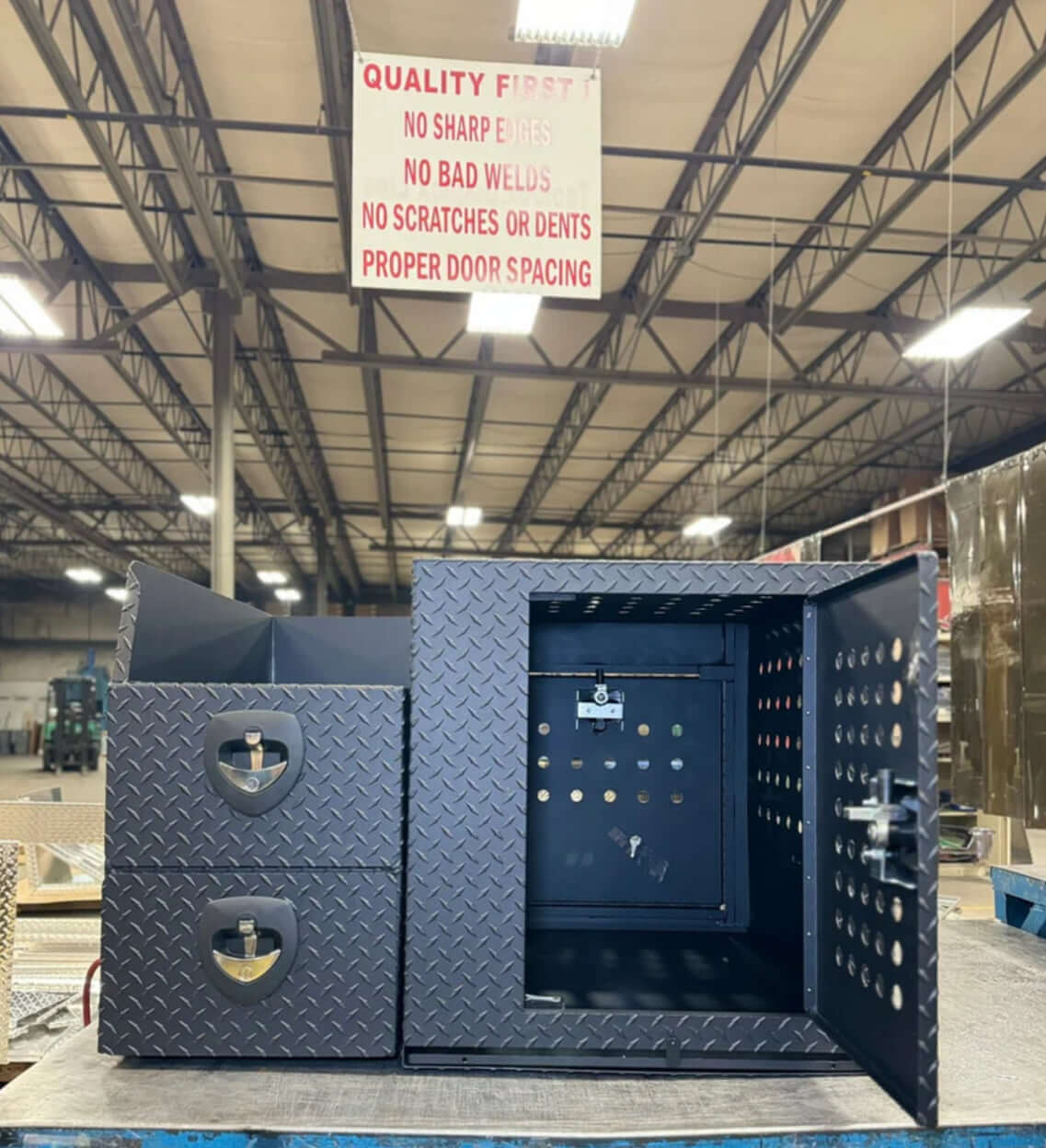 Owen's Professional K9 Deployment Unit displayed inside a warehouse, showing secure compartments for working dogs and tactical gear
