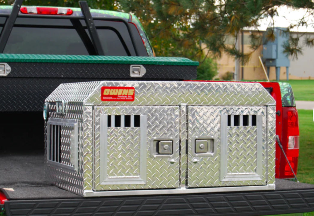 Owens ATV/SUV Without Storage Double Compartment hunting box on the back on a green truck heavy duty dog box made out of aluminum