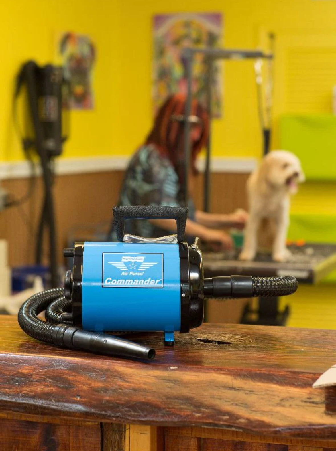 Metrovac Air Force Commander 2-speed pet dryer with 1.17 HP motor, 86 CFM airflow, and all-steel construction for efficient grooming in blue