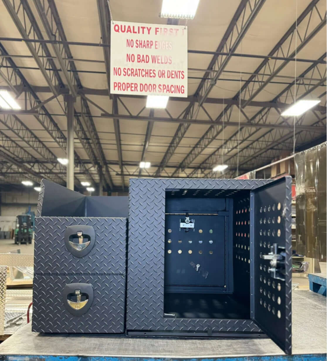 Owen's Professional K9 Deployment Unit displayed inside a warehouse, showing secure compartments for working dogs and tactical gear