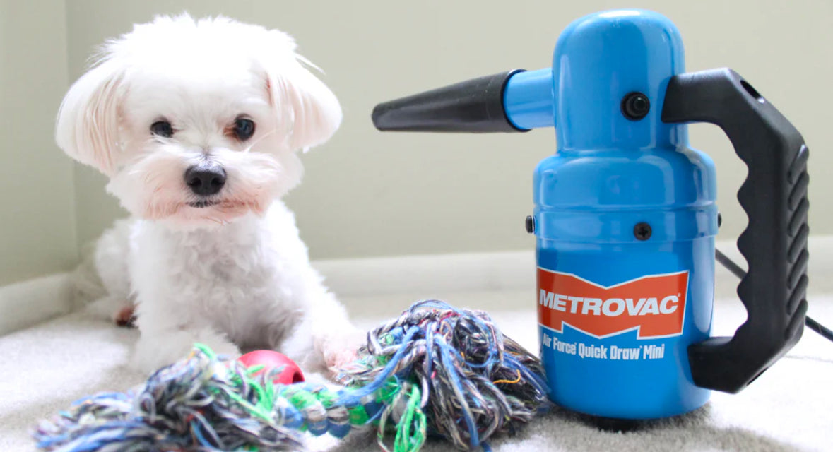 Metrovac Air Force Quick Drawn Mini Portable Pet & Dog Grooming Dryer with a picture of a dog being dried off with a dog blow dryer