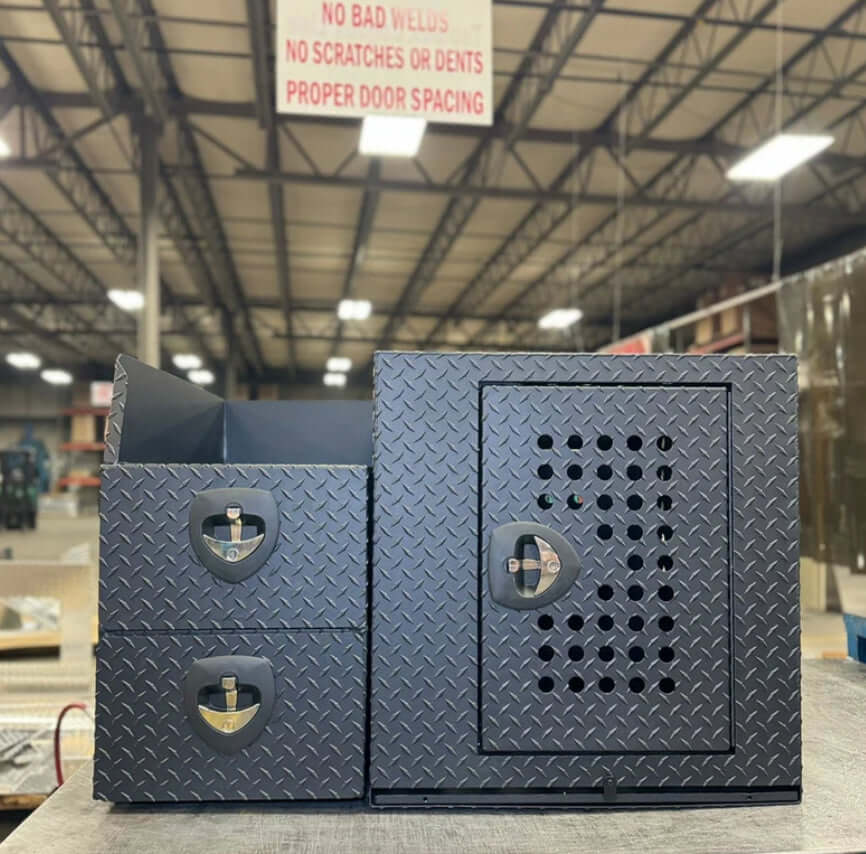 Owen's Professional K9 Deployment Unit displayed inside a warehouse, showing secure compartments for working dogs and tactical gear