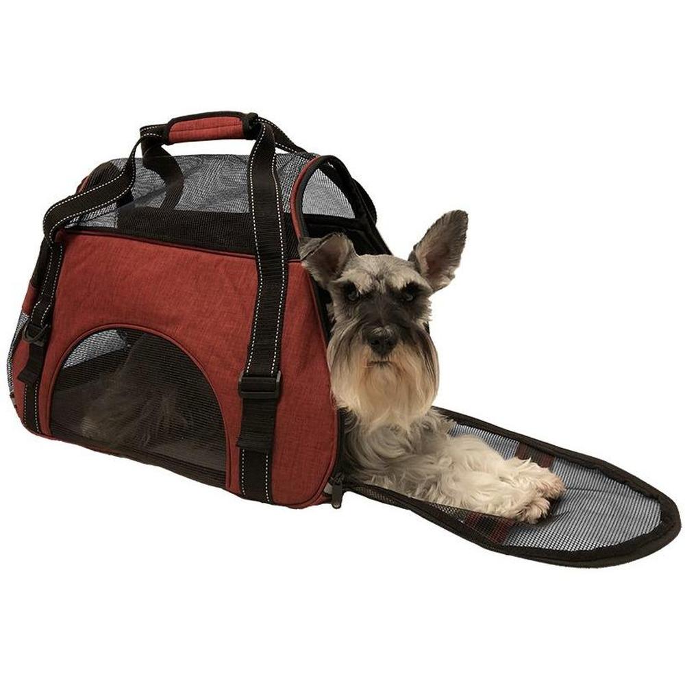 Airline-approved pet carrier backpack with small dog inside, head sticking out for safe, comfortable, and hands-free travel"