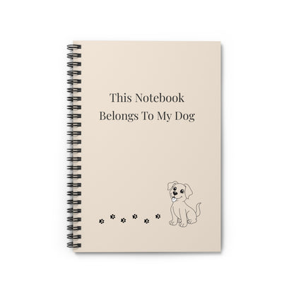 Notebook with text 'This Notebook Belongs To My Dog' and a dog illustration on a beige background