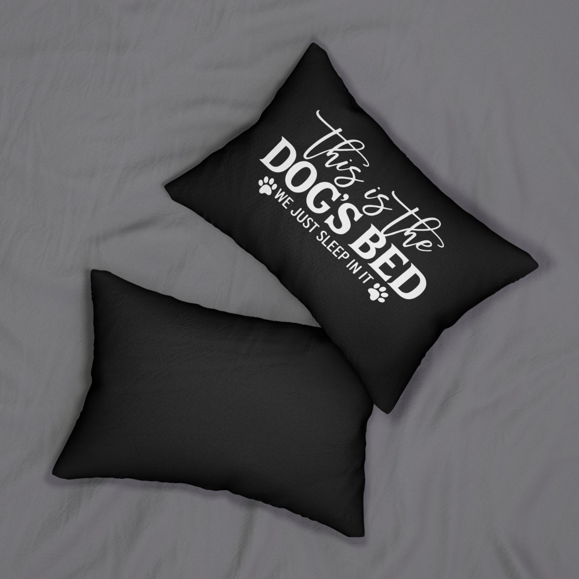 Black pillow with 'This is the dog's bed' text on a gray background