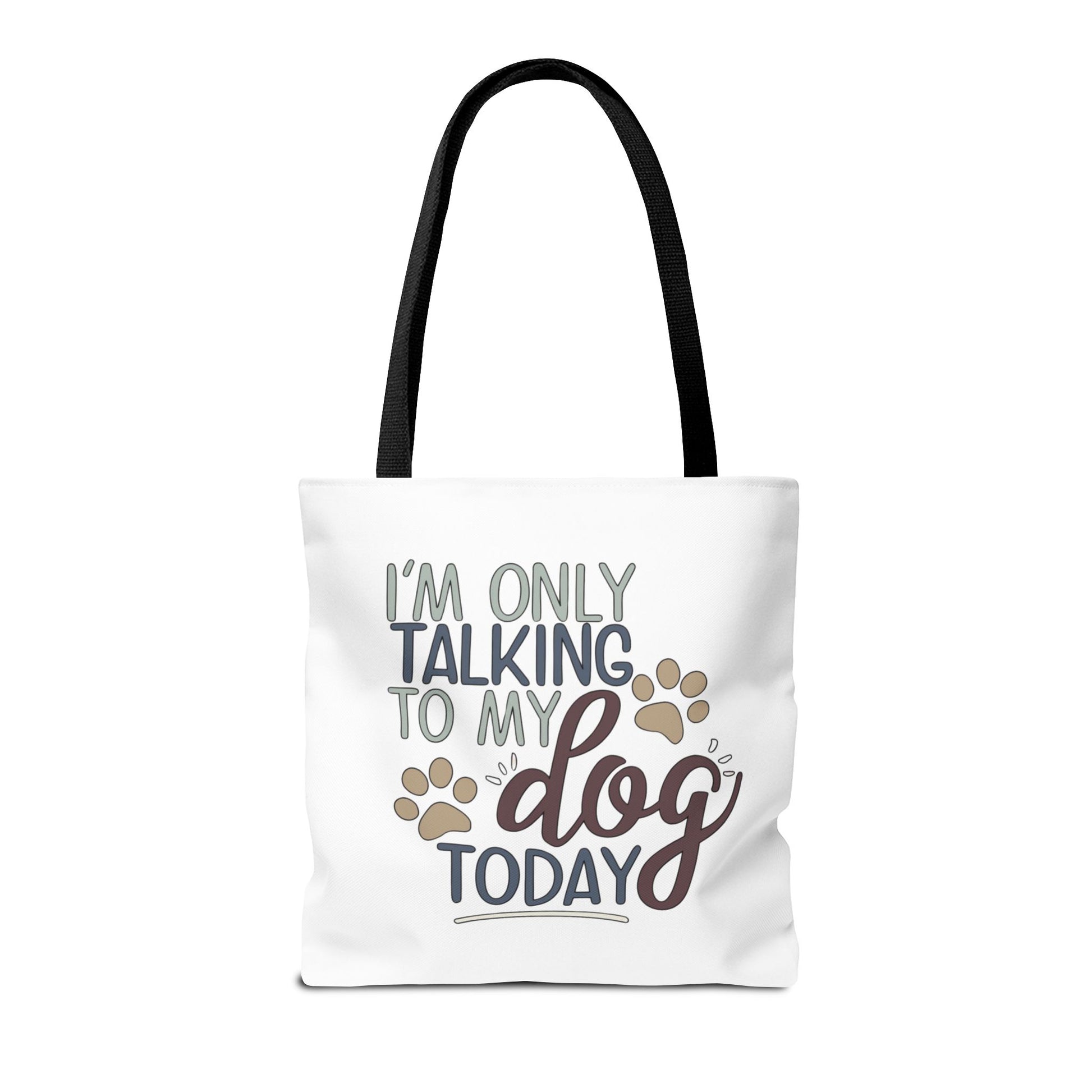 Tote bag with 'I'm only talking to my dog today' text and paw prints on a white background