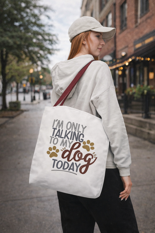 woman in city wearing “I’m Only Talking to My Dog Today” dog lover tote bag over shoulder