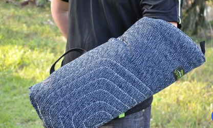 man wearing a blue Viper French Linen Puppy Bite Sleeve Level 1 for K9 training
