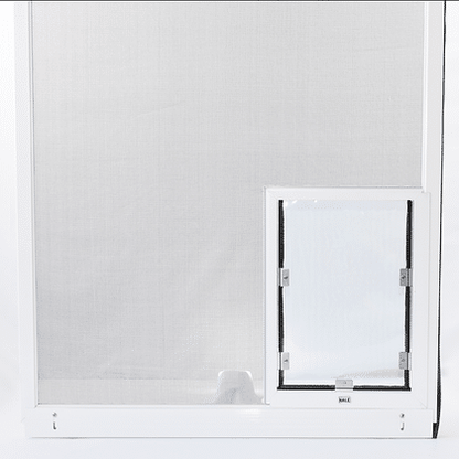 Hale Pet Door for Screen Doors installed in a screen door - white aluminum frame pet door with magnetic closing flap