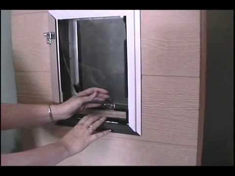 Replacement dog flap for a dog door, designed to fit securely and allow pets to enter and exit easily while keeping the elements outside.