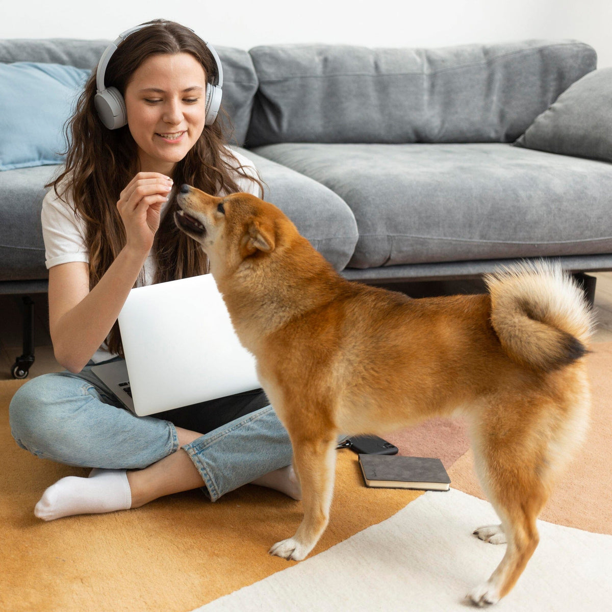 Happy dog eating a multivitamin soft chew - tasty daily vitamin treats for dogs of all sizes
